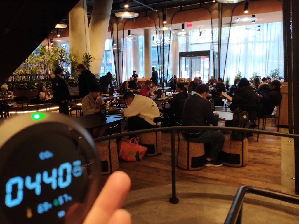 The JACX&Co food hall in Long Island City, where a carbon dioxide monitor shows 440 parts per million, at 69 degrees Fahrenheit and 57% relative humidity